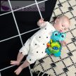 BABY EINSTEIN Aktív játék C-karikán teknős Neptune’s Sensory Sidekick™ 0hó+